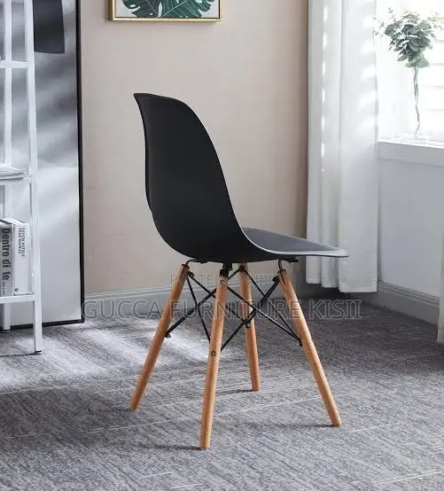 Black 4 Legged Plastic Low Back Eames Dining Chair
