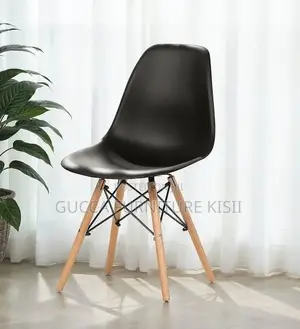 Black 4 Legged Plastic Low Back Eames Dining Chair