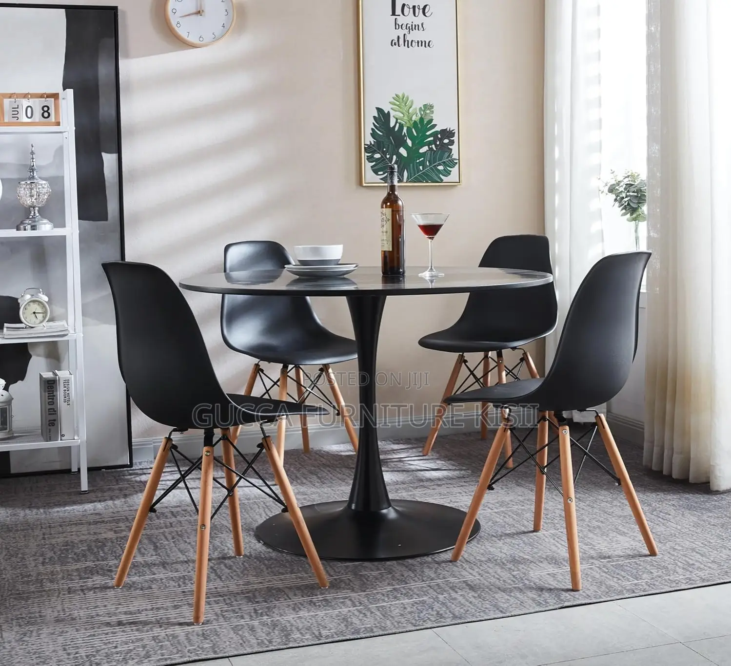 Black 4 Legged Plastic Low Back Eames Dining Chair