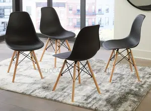 Black 4 Legged Plastic Low Back Eames Dining Chair