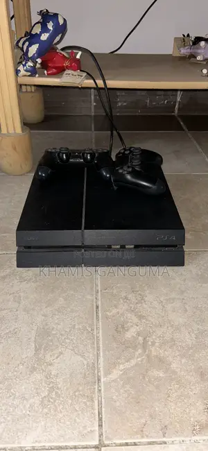 Play Station 4 Standard 500GB Chipped With 2 Pads and 5 Games