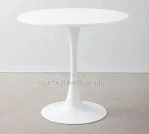 4 Seater White Circular Eames Dining Table