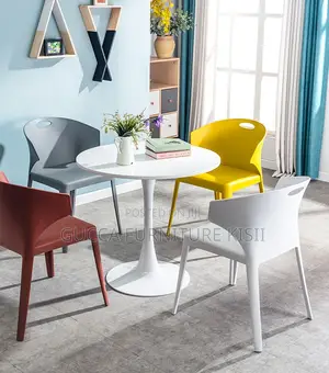 4 Seater White Circular Eames Dining Table