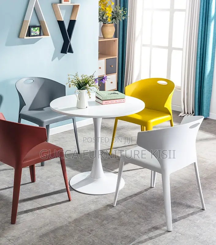 4 Seater White Circular Eames Dining Table