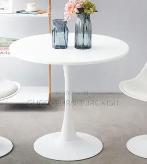 4 Seater White Circular Eames Dining Table