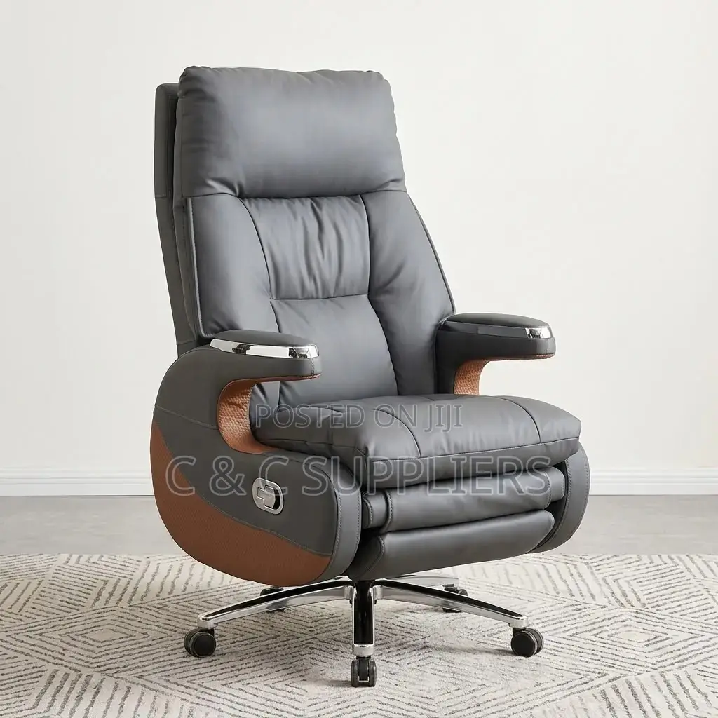 Leather Director's Seat With Footrest.