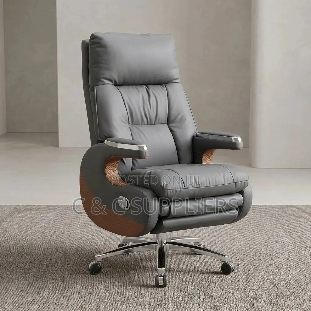 Leather Director's Seat With Footrest.