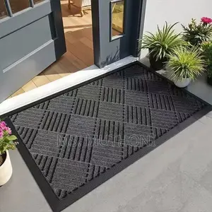 Modern Geometric Striped Doormat With a Curved Swirl Design