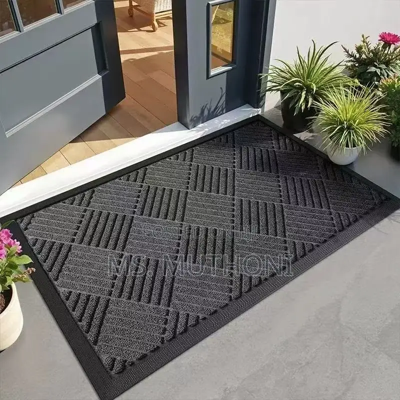 Modern Geometric Striped Doormat With a Curved Swirl Design