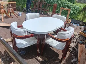 Dining Table Set a Curvy 4 Seater Cup Chair Dining Set.