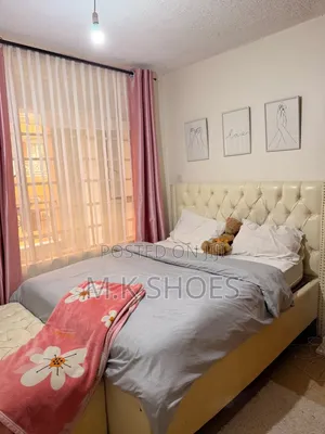 5 by 6 High Quality White Leather Bed Only 
Comes With an Ottoman