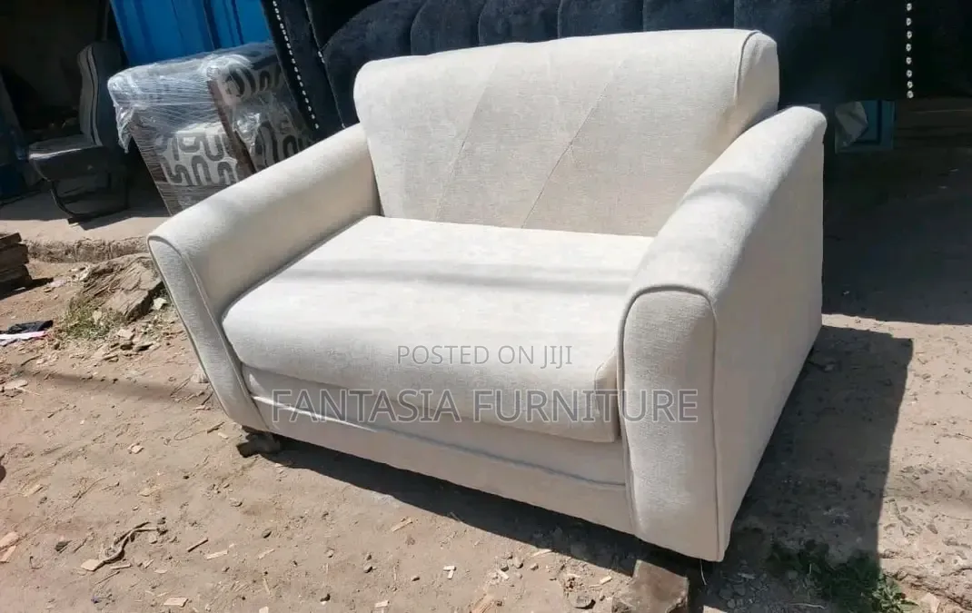 2 Seater Beige Upholstered Sofa