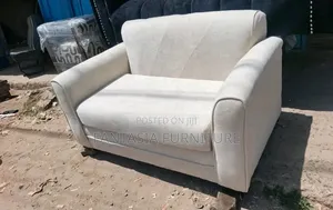 2 Seater Beige Upholstered Sofa