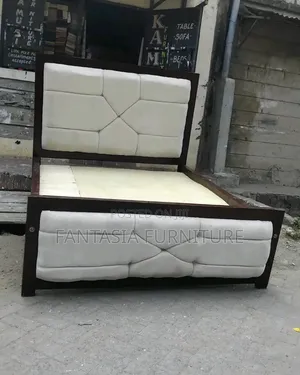 5 by 6 White and Brown Bed