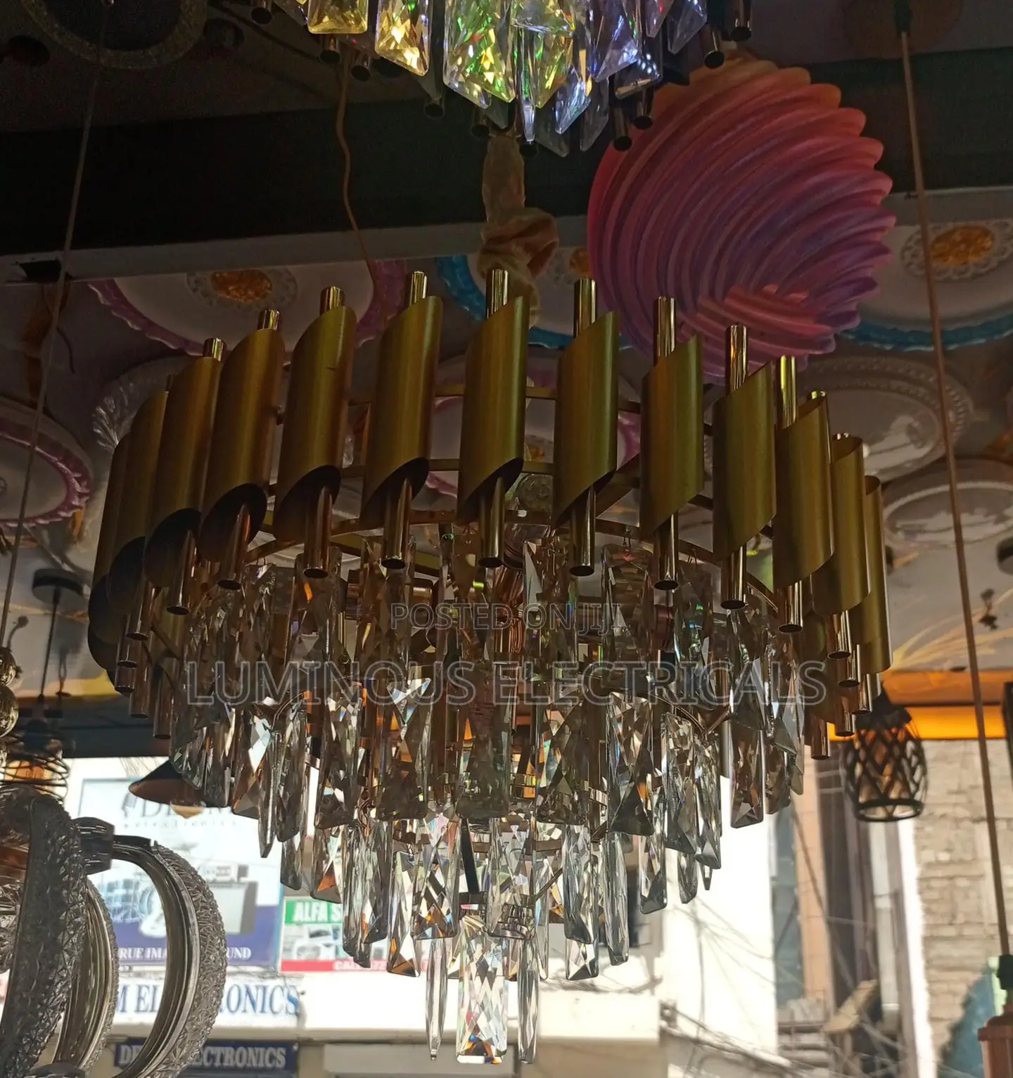Elegant Multi-Tier Gold Pipe Crystal Chandelier