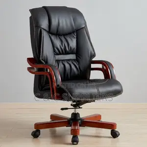 Leather Manager's Chair With Mahogany Armrest.
