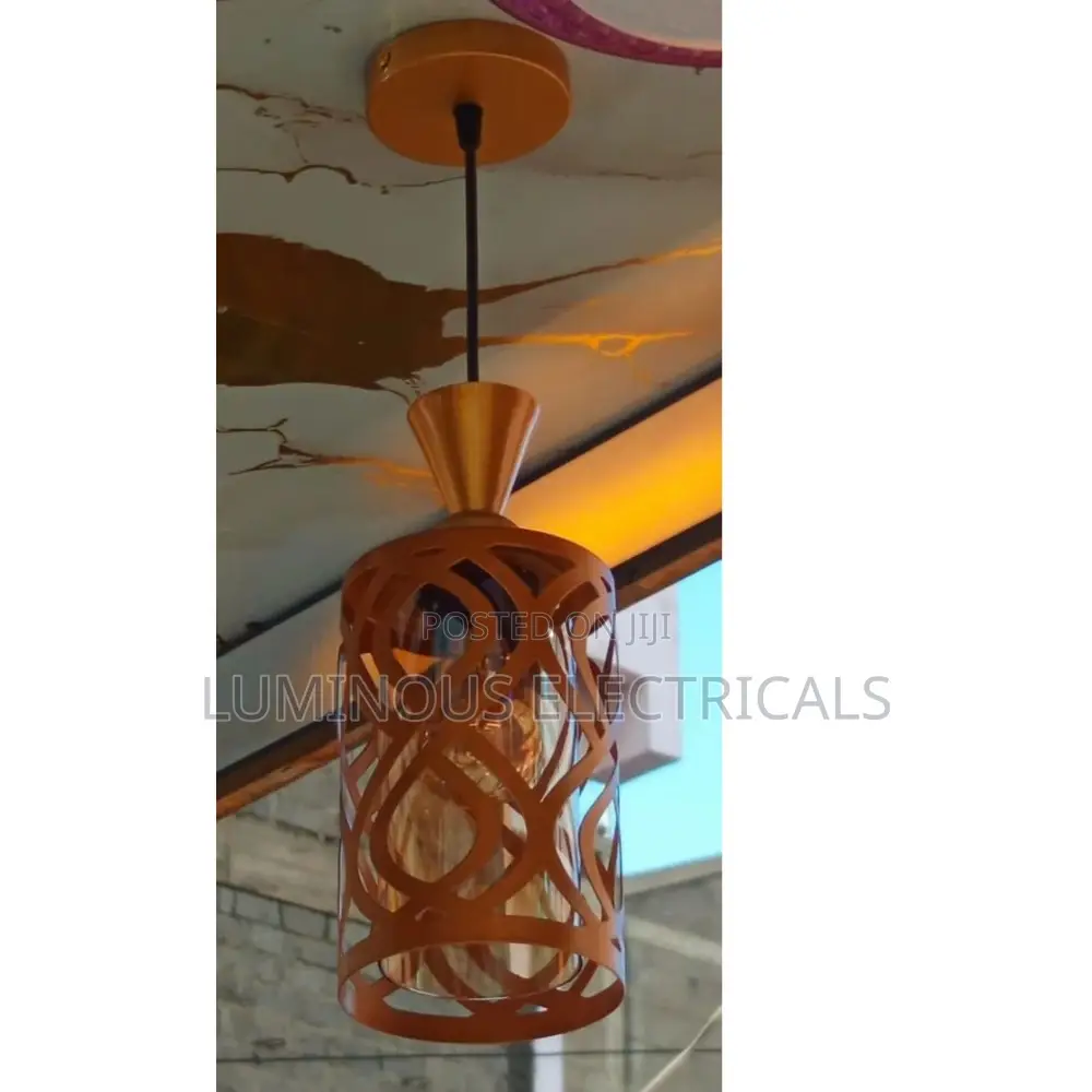 Elegant Gold Single Pendant Light With Inner Amber Glass Shade