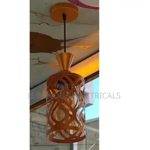 Elegant Gold Single Pendant Light With Inner Amber Glass Shade