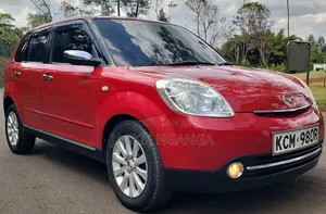 Mazda Verisa 2010 Red