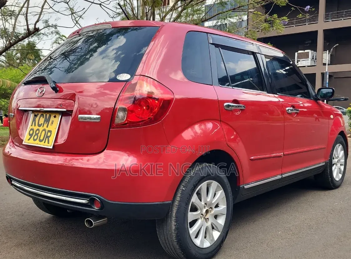 Mazda Verisa 2010 Red