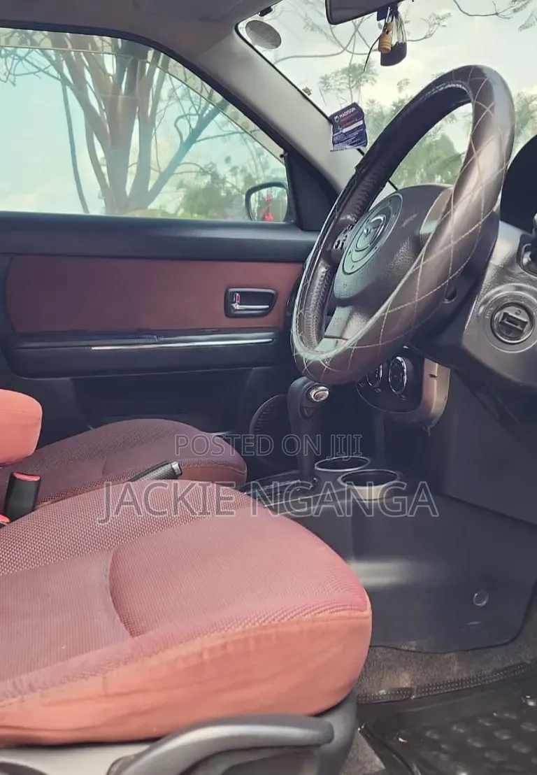 Mazda Verisa 2010 Red