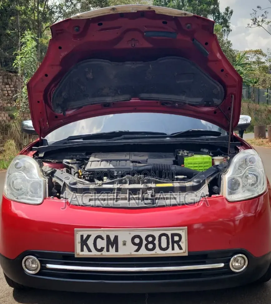 Mazda Verisa 2010 Red