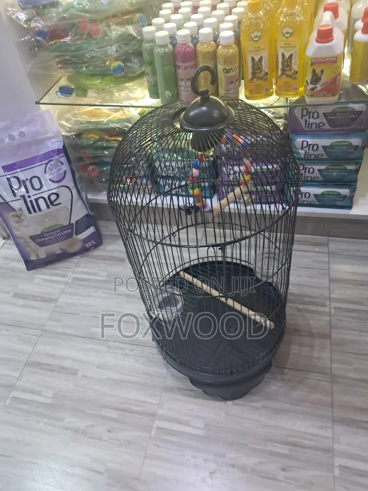 Round Metal Bird Cage With a Dome Top and Hanging Hook.