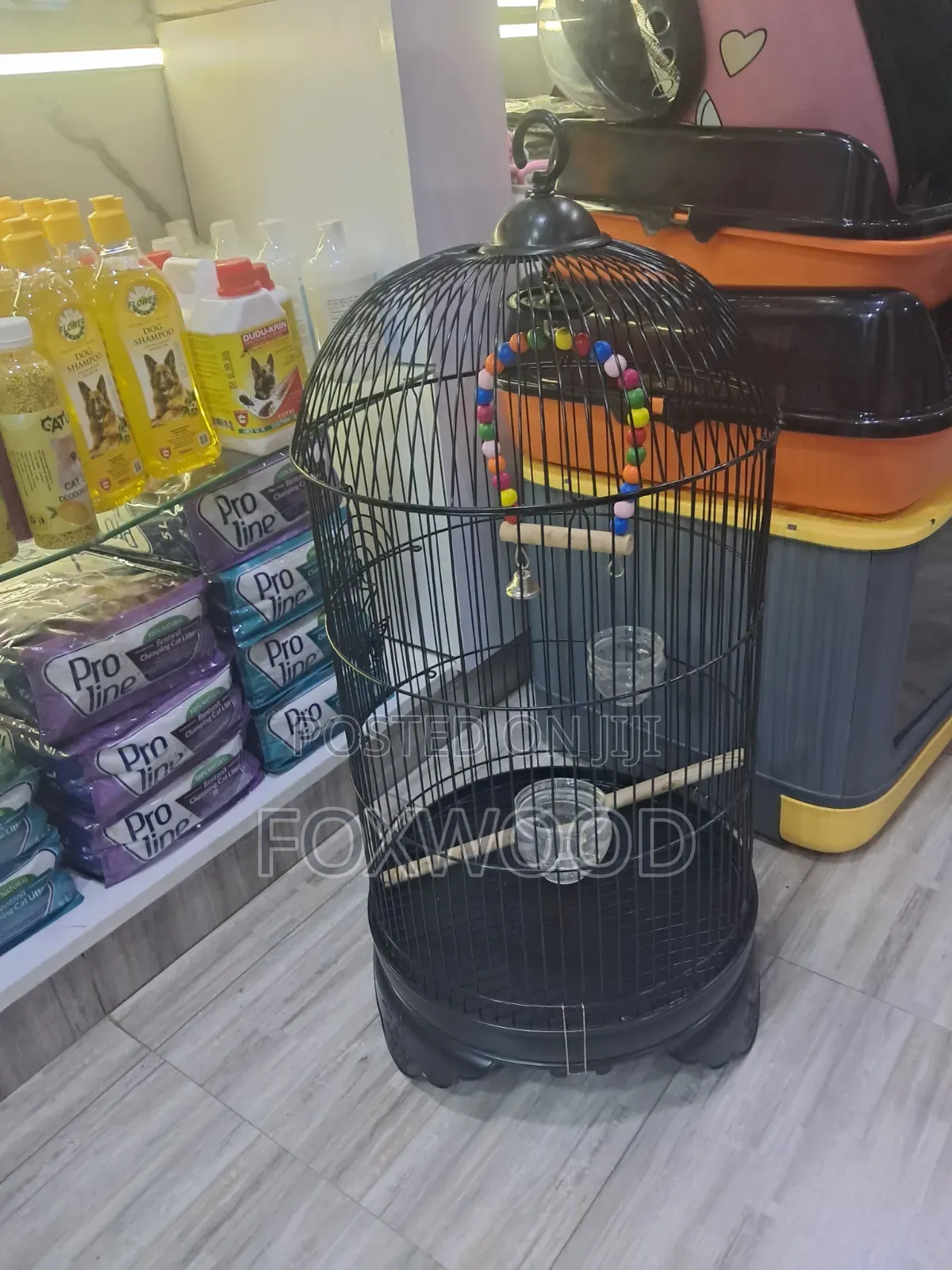 Round Metal Bird Cage With a Dome Top and Hanging Hook.