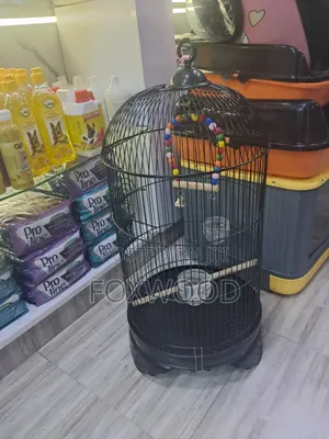 Round Metal Bird Cage With a Dome Top and Hanging Hook.