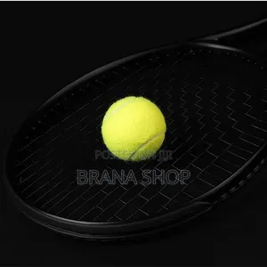 Sleek Black Lawn Tennis Racquet With Ball
