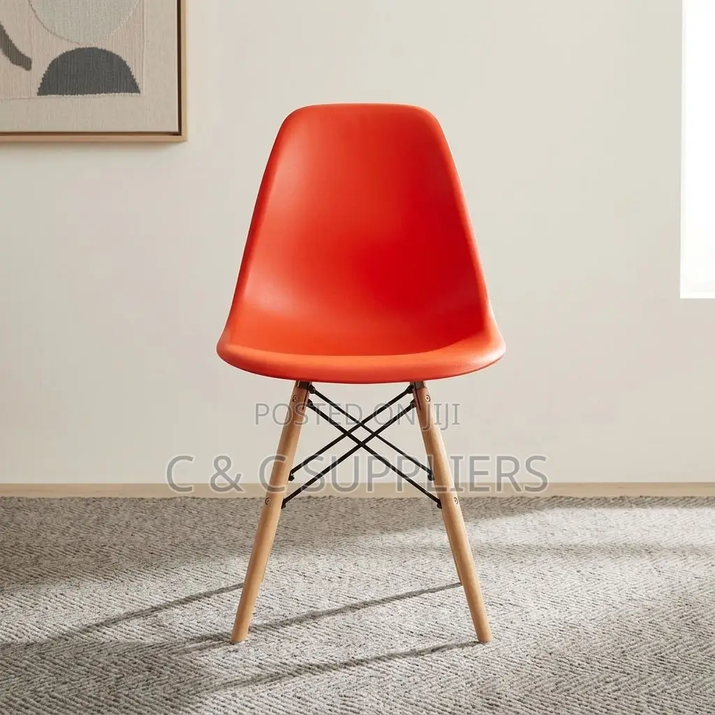 Plastic Orange Eames Dining Chair.