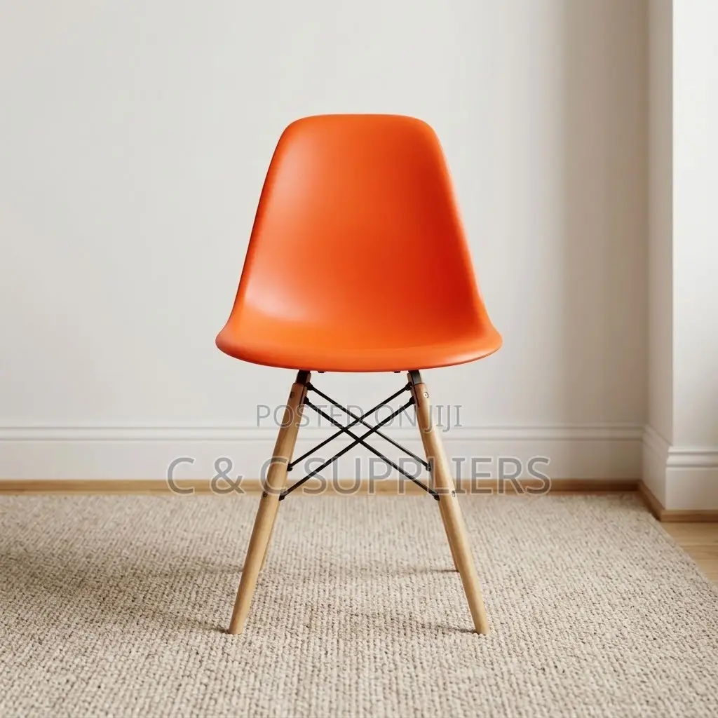 Plastic Orange Eames Dining Chair.