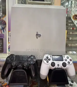 JST Unvirgined PS4 Pro, Two Pads and a Cooling and Charging Dock Stand