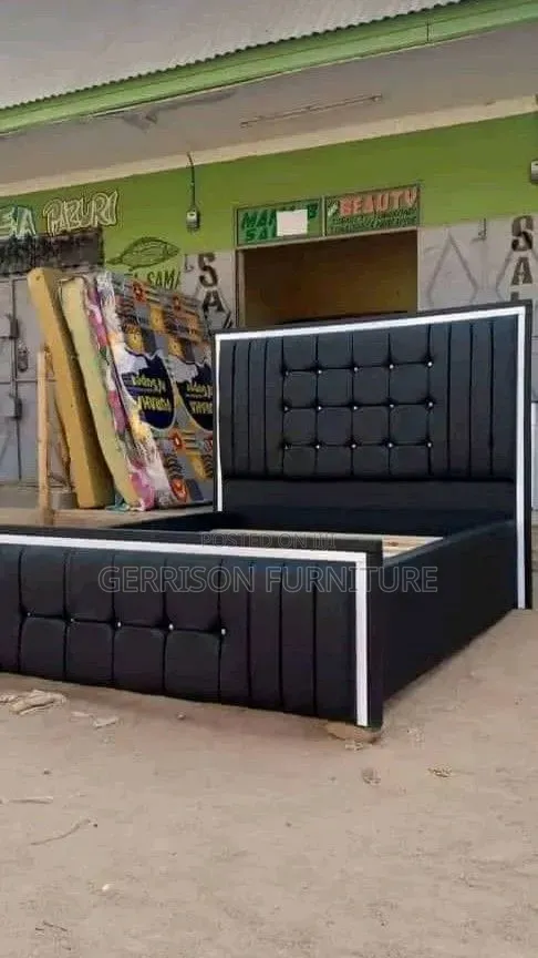 Executive Black Tufted Upholstered Bed Frame With White Border