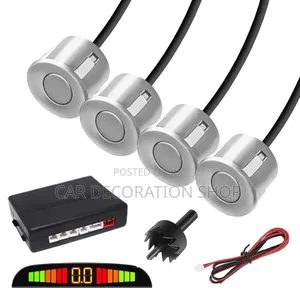 Silver Parking Sensor System Alerts Drivers to Obstacle Behing the Car