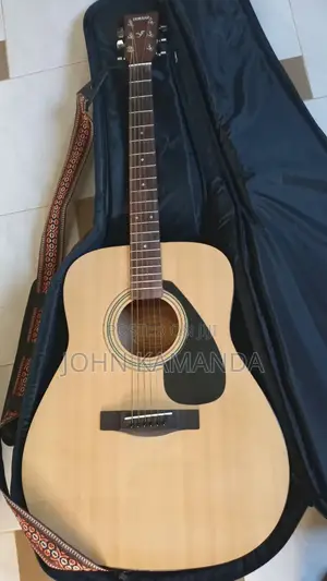 Yamaha F310 Acoustic Guitar – Gig Bag, Pluck & Strap