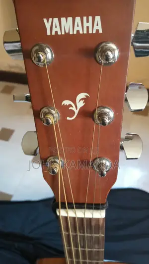 Yamaha F310 Acoustic Guitar – Gig Bag, Pluck & Strap