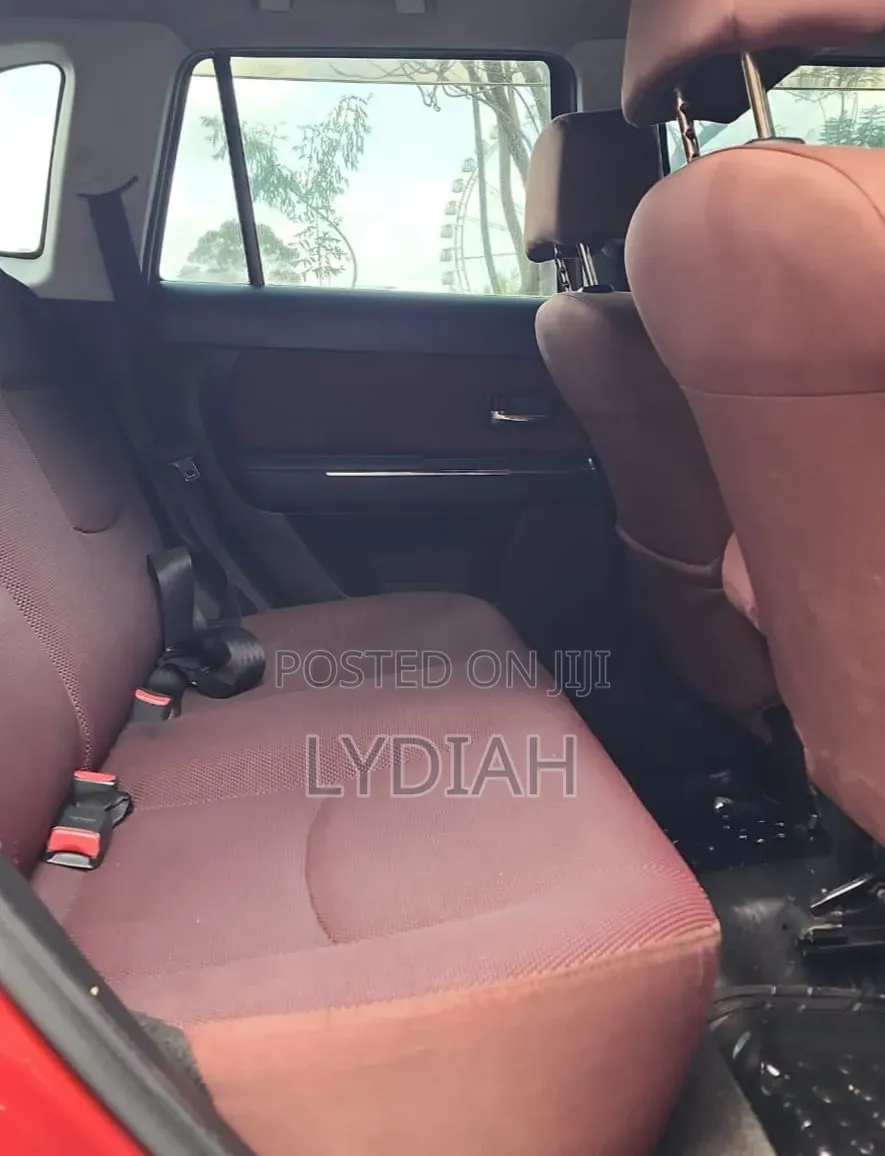 Mazda Verisa 2010 Red
