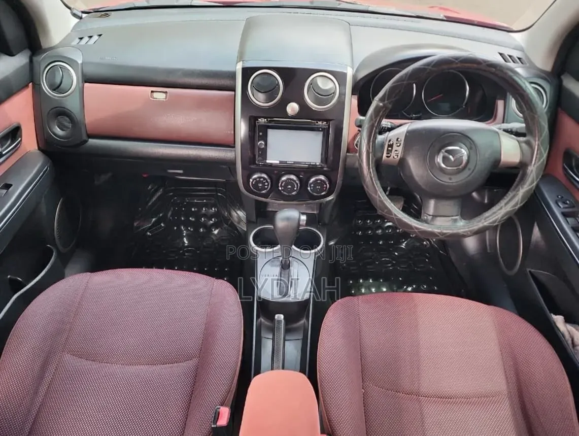 Mazda Verisa 2010 Red