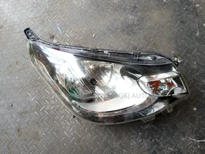E K Wagon Headlight