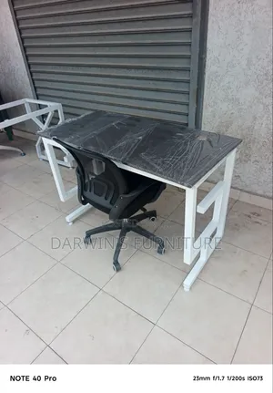 Gstand and Black Mesh Chair