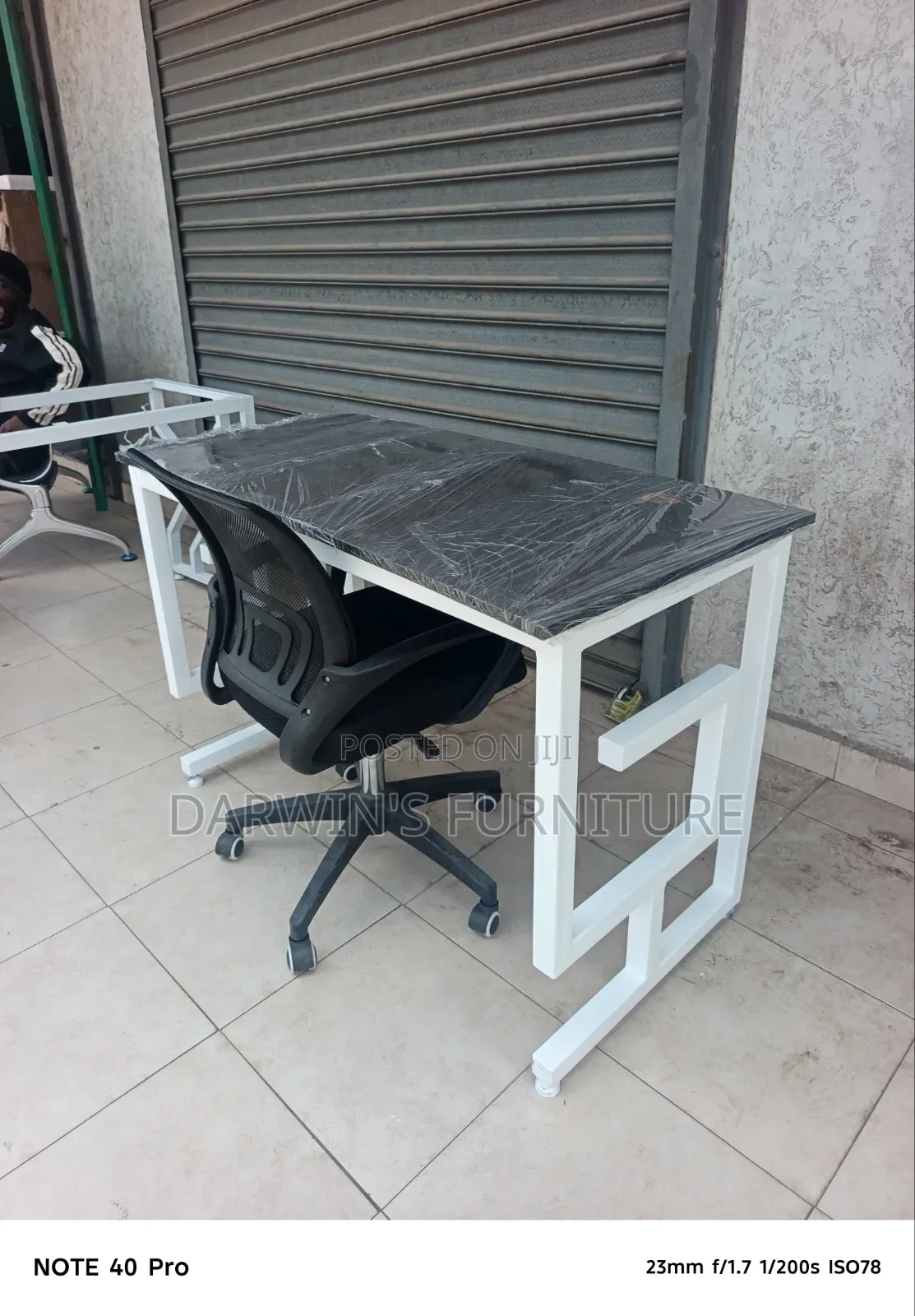 Gstand and Black Mesh Chair