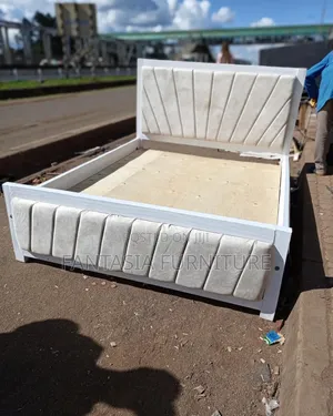 5 by 6 White Upholstered Wooden Bed