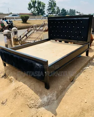 5 by 6 Black Tufted Wooden Bed
