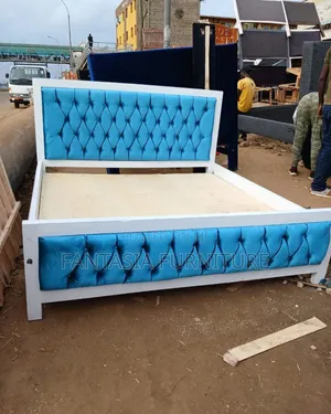 6 by 6 Turquoise Tufted Bed
