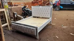 5 by 6 White Tufted Bed