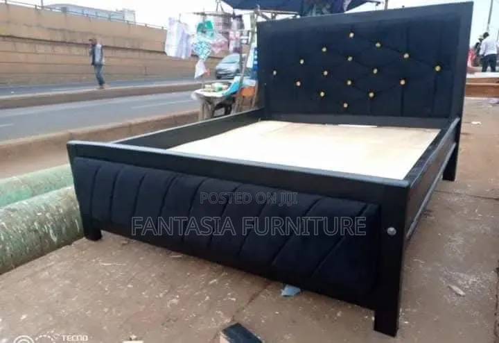 5 by 6 Black Tufted Bed