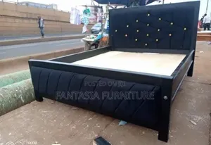 5 by 6 Black Tufted Bed