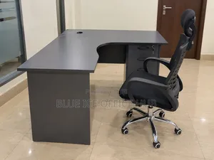 Gray L-Shaped Office Desk With Chair