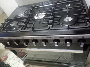 1. Nunix 60×90cm 4+1 Gas Cooker With Wok Burner and Hot Plate